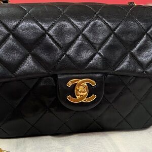 Chanel black lamb skin Mini  flap bag
